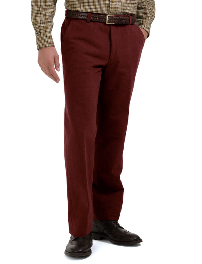 Tailored in soft Italian cotton twill. Relaxed fit, plain-front. Herringbone pocketing. Alterable waistband. Finished hems, uncuffed bottoms. Signature logo buttons and ribbon at inside waist. Dry clean. Imported.