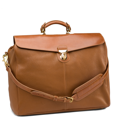 American deerskin. Linen lining. Brass hardware. Adjustable shoulder strap. 12" x 9". Made in the USA.