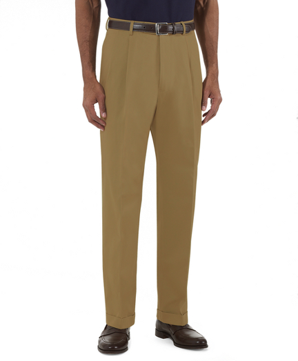 The essential dress chino is beautifully tailored in lightweight pure cotton twill with an ultrasoft hand. Constructed split waistband allows for easy alterations. On-seam side pockets. Back darts for a perfect fit. Double-pleat front. Cuffed. Dry clean. Imported.