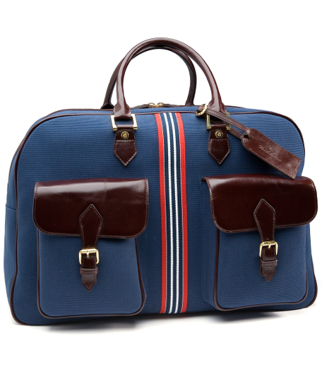 Durable cotton canvas bags with web stripe details and leather trim. Brass hardware. Top zipper. Two outside flap pockets. Luggage tag. 20" x 25" x 8".
