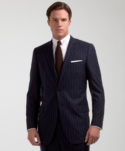 Inspired by our archives, the 1818 Fitzgerald suit is distinguished by narrow lapels, higher armholes and trimmer fitting plain-front trousers. It is truly a statement of elegance and refinement. Tailored from pure wool. 2-button. Center vent. Dry clean only. Made in Italy.