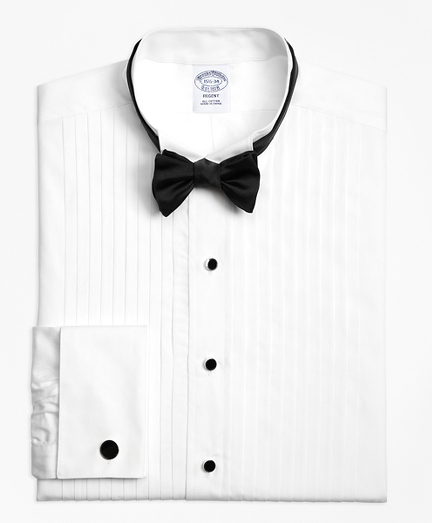 Tailored in pure 100s 2-ply cotton broadcloth with French cuffs and a removable mother-of-pearl button strip. Machine wash. Imported. Cuff links not included. Also available in Traditional fit.