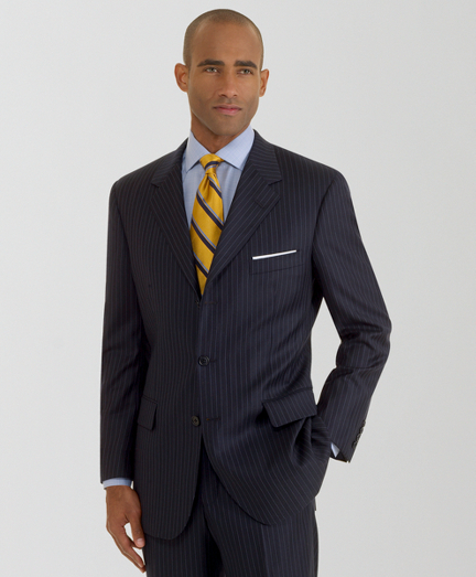 The Brooks Brothers original, tailored from elegant Saxxon wool woven in the USA, favored for its relaxed fit, natural shoulders and easy fitting trousers. 3-button jacket with center vent. Double reverse pleat trousers. Dry clean only. Made in the USA.
