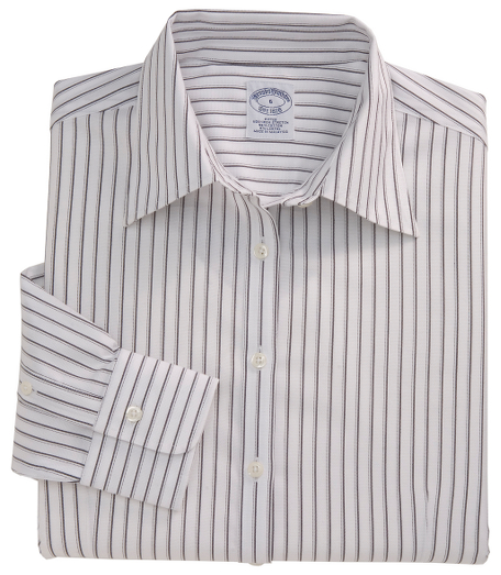 Our fitted silhouette, slightly tailored in cotton with a touch of  DOW XLA for stretch, treated toremain virtually wrinkle-free. Traditional placket. Pucker-free seams. Front and back darts. Forward point collar. Shirred barrel cuffs. Machine wash. Imported. Also available in Misses.