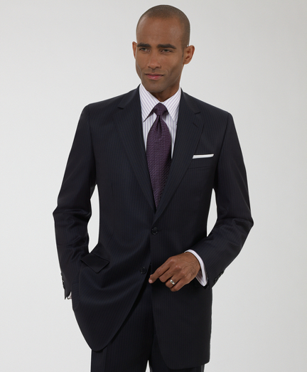 The Brooks Brothers original, tailored from elegant wool woven in Italy, favored for its relaxed fit, natural shoulders and easy fitting trousers. Fullly lined. 2-button, center vent. Pleat-front trousers. Dry clean only. Made in Italy.
