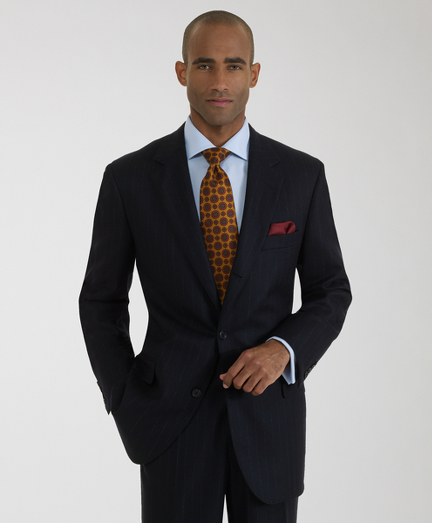 The Brooks Brothers original, tailored from elegant Saxxon wool woven in the USA, favored for its relaxed fit, natural shoulders and easy fitting trousers. 3-button sack, center vent. Plain front trousers. Dry clean only. Made in the USA.