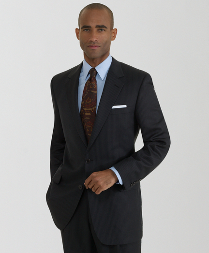 The Brooks Brothers original, tailored from elegant wool woven in Italy, favored for its relaxed fit, natural shoulders and easy fitting trousers. Fully lined. 2-button, center vent. Pleat-front trousers. Dry clean only. Made in Italy.