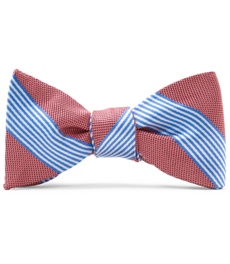 Pure silk woven in England. Dry clean. Made in the USA. Self-tie bow.