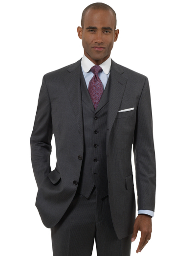 A contemporary take on the classic Brooks Brothers suit. Tailored from elegant Saxxon wool woven in the USA. Updated with slimmer lines, a narrower lapel with pickstitch detail and trimmer trousers. Fully lined. 3-button jacket, side vents with vest. Plain front trousers. Dry clean.  Made in the USA.