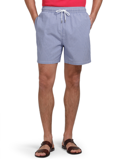 Seersucker cotton and nylon fabric.  Mesh lining. Hidden key pocket at inside of swimsuit. Velcro back pocket for secure storage. 4 3/4" inseam. Machine wash. Imported.