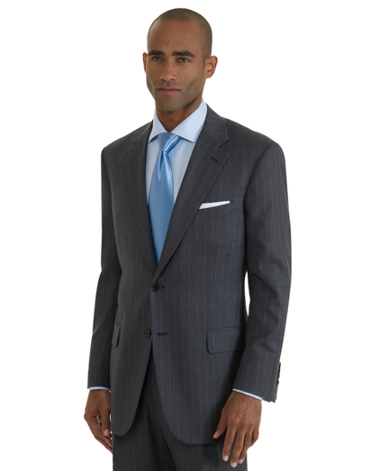 Hand-tailored in elegant English wool. Distiguished by impeccable workmanship and near bespoke details. 2-button, center vent. Double-reverse pleat trousers. Dry clean. Hand tailored in the USA.