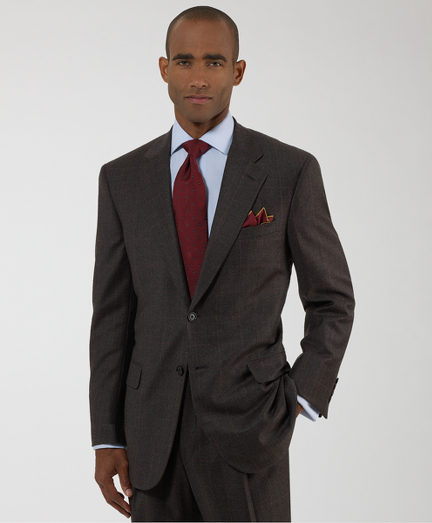 Hand-tailored in elegant wool woven in Italy. Distinguished by impeccable workmanship and near-bespoke details. 2-button, center vent. Double-reverse pleat trousers. Dry clean. Hand-tailored in the USA.