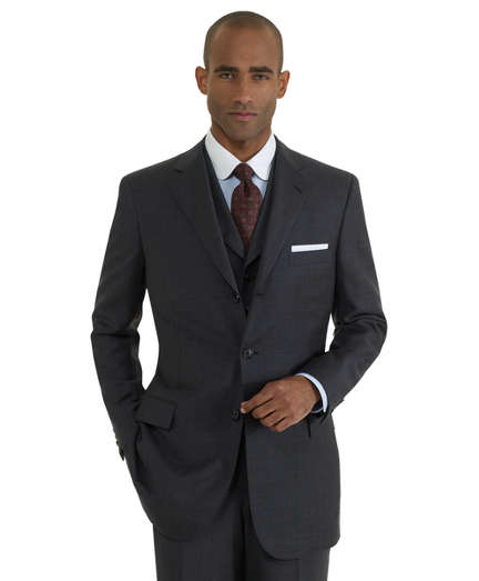 Hand-tailored in elegant Italian wool. Distiguished by impeccable workmanship and near bespoke details. 3-button, center vent and vest with pickstitch. Plain front trousers. Dry clean. Hand tailored in the USA.