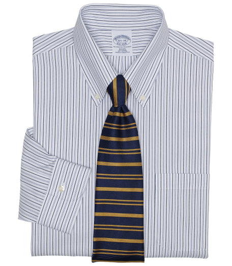Pure pinpoint cotton treated to remain virtually wrinkle-free. Pucker-free seams. Center back pleat and signature shirring at barrel cuffs. The original Polo� button-down collar. Left chest pocket. Machine wash. Imported. Also available in Traditional fit.