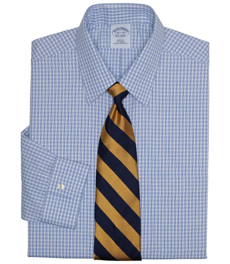 Pure pinpoint cotton treated to remain virtually wrinkle-free. Pucker-free seams. Center back pleat and signature shirring at barrel cuffs. Forward point collar. Left chest pocket. Machine wash. Imported. Also available in Traditional fit.