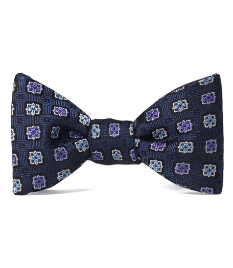 Pure silk woven in Italy. Self-tie. Dry clean. Made in the USA.