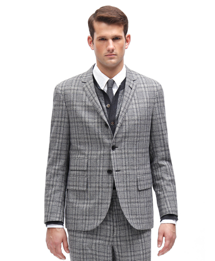 Wool and cashmere blend.  3-button, double back vent. Genuine horn buttons. Jacket sleeves are unfinished. Signature cuff is 2-button holes. Full canvas construction. Locker loop at back neck. Jacket is lined in signature stripe lining of cotton and modal blend. Trousers are button-fly and lined in 100% Bemberg signature stripe lining. Unfinished hem. Can be finished as seen or with a cuff and no break. Dry clean only. Made in Italy.