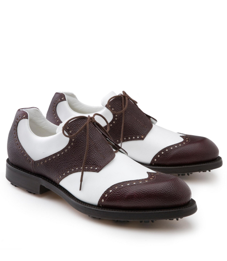 Calfskin upper. Leather sole with soft spikes. Leather lined. Made in Italy.
