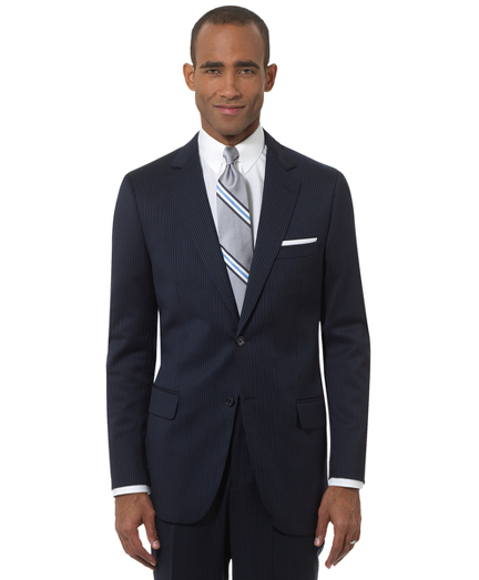 Inspired by our archives, the 1818 Fitzgerald suit is distinguished by narrow lapels, higher armholes and trimmer fitting plain-front trousers. It is truly a statement of elegance and refinement. Tailored from pure wool woven in the Italy. 2-button. Center vent. Dry clean only. Made in Italy.