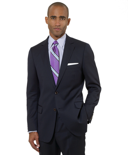 Inspired by our archives, the 1818 Fitzgerald suit is distinguished by narrow lapels, higher armholes and trimmer-fitting, plain-front trousers. It is truly a statement of elegance and refinement. Tailored from pure wool woven in Italy. Two-button. Center vent. Dry clean only. Made in Italy.