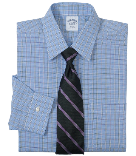 Pure cotton broadcloth made with pucker-free seams and specially treated to remain virtually wrinkle-free. Forward point collar. Signature shirring at barrel cuffs. Center back pleat. Left chest pocket. Machine wash. Imported. Also available in Traditional fit.