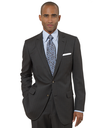Inspired by our archives, the 1818 Fitzgerald suit is distinguished by narrow lapels, higher armholes and trimmer-fitting, plain-front trousers. It is truly a statement of elegance and refinement. Tailored from pure wool woven in Italy. Two-button. Center vent. Dry clean only. Made in Italy.