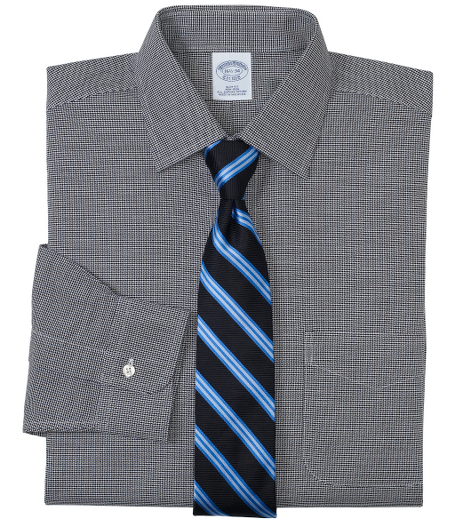 Lightweight cotton oxford. Made with pucker-free seams and treated to remain virtually wrinkle-free. Ainsley collar. Center back pleat. Barrel cuffs. Machine wash. Imported. Also available in Traditional fit.