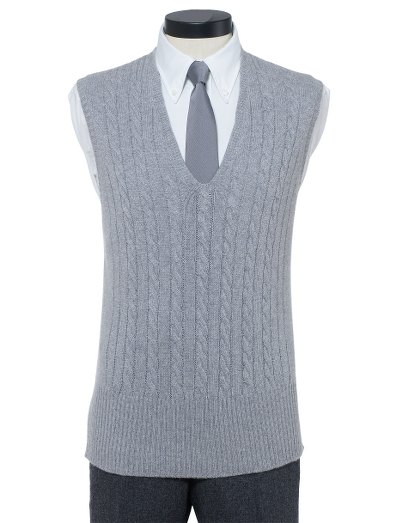 Pure Scottish cashmere. Classic cable pattern. Dry clean. Made in Scotland.