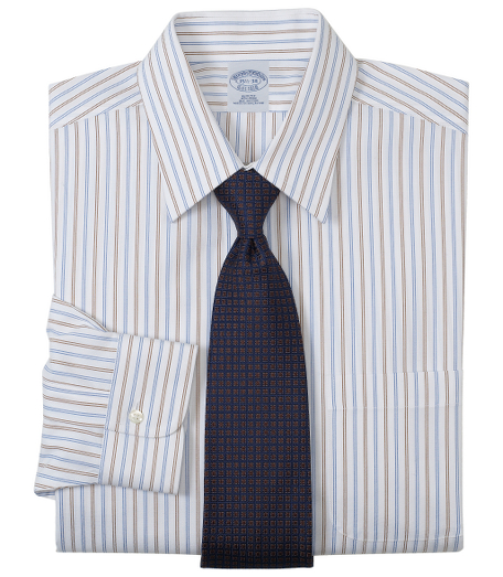Pure pinpoint cotton made with pucker-free seams and specially treated to remain virtually wrinkle-free. Forward point collar. Signature shirring at barrel cuffs. Center back pleat. Left chest pocket. Machine wash. Imported. Also available in Traditional fit.