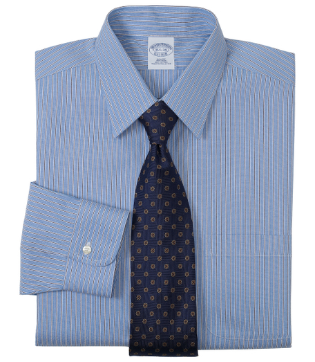 Pure pinpoint cotton made with pucker-free seams and specially treated to remain virtually wrinkle-free. Forward point collar. Signature shirring at barrel cuffs. Center back pleat. Left chest pocket. Machine wash. Imported. Also available in Traditional