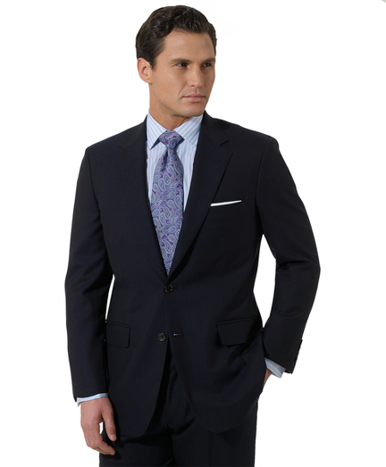 Pure wool woven in Italy. Full canvas construction. Genuine horn buttons. Hand stitch details. Madison fit which is favored for its relaxed fit, natural shoulders and easy fitting trousers. 2-button, center vent. Pleat front trousers.  Dry clean. Made in the USA.