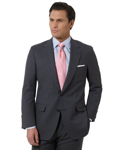 Pure wool woven in England. Full canvas construction. Genuine horn buttons. Hand stitch details. Madison fit which is favored for its relaxed fit, natural shoulders and easy fitting trousers. 2-button, center vent. Pleat front trousers.  Dry clean. Made in the USA.