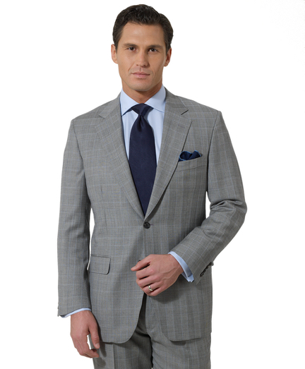 Pure wool woven in England. Full canvas construction. Genuine horn buttons. Hand stitch details. Madison fit which is favored for its relaxed fit, natural shoulders and easy fitting trousers. 2-button, center vent. Pleat front trousers.  Dry clean. Made in the USA.