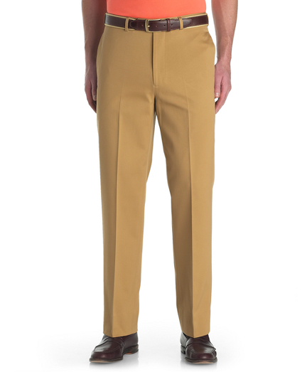 The essential dress chinos are beautifully tailored in lightweight pure cotton twill with an ultrasoft hand. Constructed split waistband allows for  easy alterations. On-seam side pockets. Back darts for a perfect fit. Plain front. Finished, uncuffed hems. Dry clean. Imported.