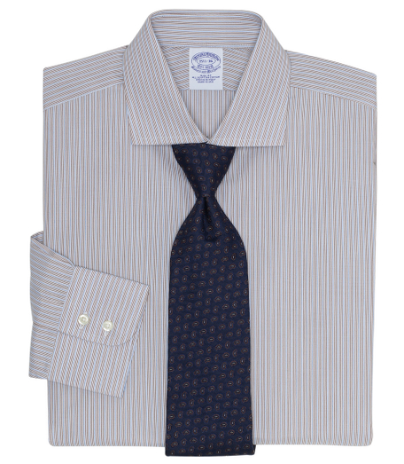 Pure Egyptian cotton woven in Italy. French front placket and chevron split-back yoke. English collar. Signature shirring at  double-button  barrel cuffs. Superdurable buttons. Machine wash. Made in the USA.