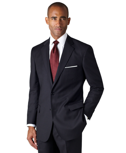 A contemporary take on the classic Brooks Brothers suit. Tailored from elegant wool woven in Italy. Updated with slimmer lines, a narrower lapel with pickstitch detail and trimmer trousers. Fully lined. Two-button jacket with center vent. Plain-front trousers. Dry clean. Made Italy.