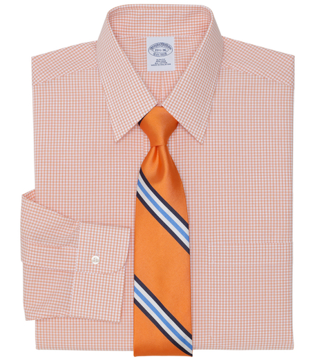 Pure cotton broadcloth made with pucker-free seams and specially treated to remain virtually wrinkle-free. Forward point collar. Signature shirring at barrel cuffs. Center back pleat. Left chest pocket. Machine wash. Imported. Also available in Traditional fit.