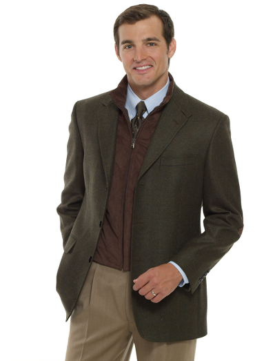 Pure wool woven in England. 3-button with removable faux suede vest. 100% Bemberg lining. Dry clean. Made in Italy.