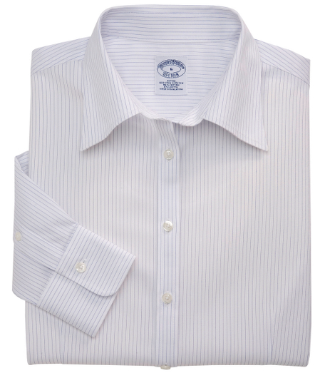 Fitted silhouette, slightly tailored for a slimmer appearance.  Woven in cotton specially treated to remain virtually wrinkle free, with a touch of  DOW XLA for stretch. Traditional placket. Pucker-free seams. Front and back darts. Forward point collar. Shirred barrel cuffs. Machine wash. Imported.