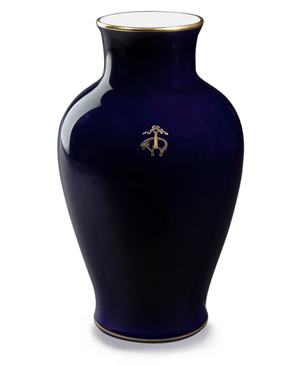 This timeless gift is traditionally crafted of pure Japanese porcelain in classic cobalt blue patterns that are forever patrician, brilliant, and beautiful. Hand-painted details, in gold and platinum, are fired at a temperature of 1,460 degrees centigrade, for a lasting luster and deep, protected sophistication. Presented in a beautiful gift box. 11" tall. Hand wash only. Imported.