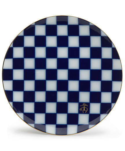 A timeless gift for any occasion, this beautiful plate is traditionally crafted of pure Japanese porcelain with an exciting checkerboard or "Ichimatsu" motif, believed to be inspired from the wardrobe of a Kabuki actors who would have worn garments embellished with this pattern. Hand-painted details in gold and platinum, are fired at a temperature of 1,460 degrees centigrade, for a lasting luster and deep, protected sophistication. Presented in a beautiful gift box. 9" diameter. Hand wash only. No item in this collection is designed for use in a dishwasher or in microwave or conventional ovens. Imported.