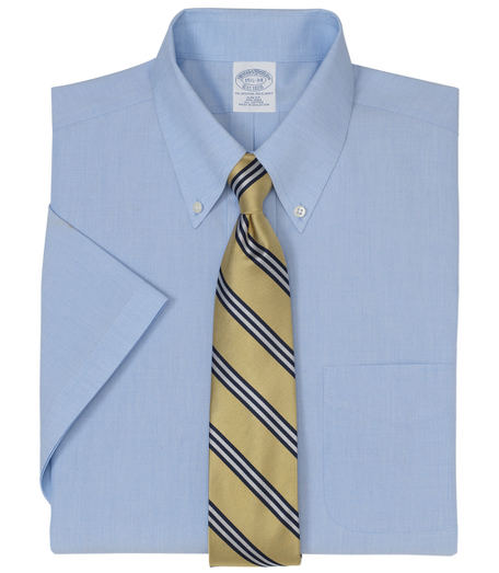 Pure cotton broadcloth made with pucker-free seams and specially treated to remain virtually wrinkle-free. The original Polo� button-down collar. Center back pleat. Left chest pocket. Machine wash. Imported. Also available in Traditional fit.