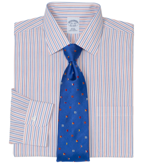 Pure cotton broadcloth made with pucker-free seams and specially treated to remain virtually wrinkle-free. Ainsley collar. Signature shirring at barrel cuffs. Center back pleat. Left chest pocket. Machine wash. Imported. Also available in Traditional fit.