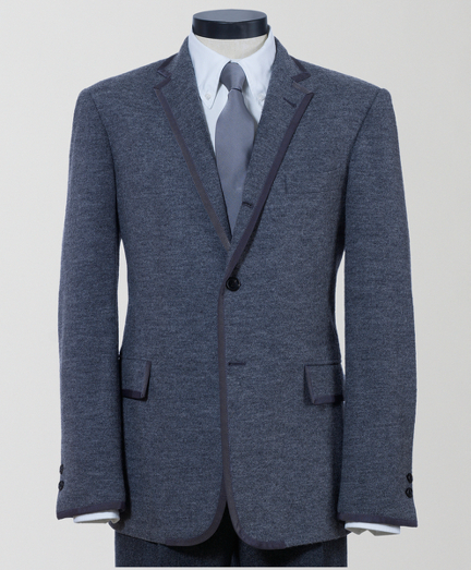 Pure wool. 3-button, double back vent. Genuine horn buttons. Grey tipping. Full canvas construction. Locker loop at back neck. Jacket is 1/2 lined in signature stripe lining of cotton and modal blend. Dry clean. Made in Italy.