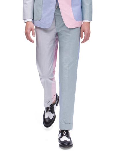 Pure cotton oxford.  Button-fly with genuine mother-of pearl buttons. Half-lined with 100% Bemberg. Unfinished hem. Can be finished as seen or with a cuff and no break.  Made in Italy. Dry clean only.