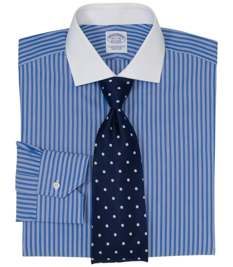 Pure Egyptian cotton woven in Italy. French front placket and chevroned split-back yoke. Tennis collar. Signature shirring at mitered cuffs. Machine wash. Made in the USA.