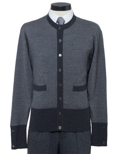 Pure wool. Mother-of-pearl buttons. Button cuff with grosgrain on sleeve and placket. Locker loop at back neck. Dry clean. Imported.