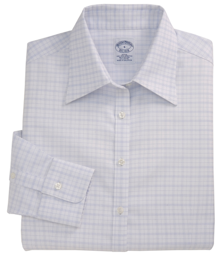Our fitted silhouette, slightly tailored for a slimmer appearance. Woven in cotton specially treated to remain virtually wrinkle free, with a touch of  DOW XLA for stretch. Traditional placket. Pucker-free seams. Front and back darts. Forward point collar. Shirred single-button barrel cuffs. Machine wash. Imported. Also available in Traditional fit.