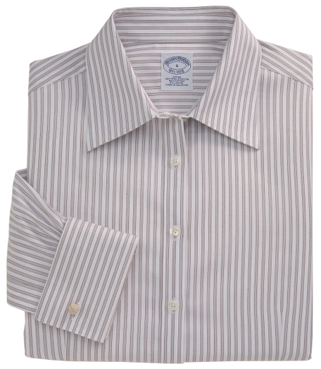Our fitted silhouette, slightly tailored in cotton with a touch of  DOW XLA for stretch, treated to remain virtually wrinkle-free. Traditional placket. Pucker-free seams. Front and back darts. Forward point collar. Shirred barrel cuffs. Machine wash. Imported. Also available in Misses.