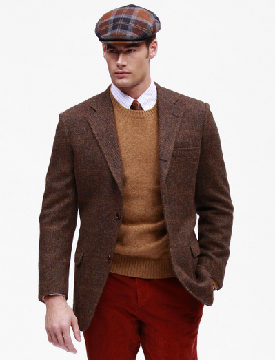 Authentic Harris tweed fabric woven in Scotland. 3-button sack with patch flap pockets. Madison fit. Dry clean. Imported.